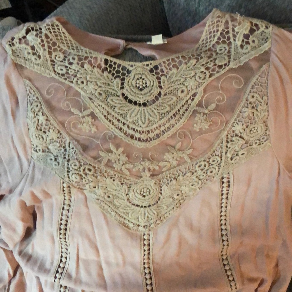 Lovely short long sleeved dress.